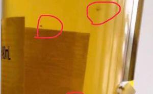 男子投訴“菠蘿啤”有異物，食藥監(jiān)管部門查證后獎兩千 