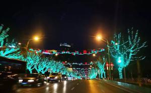 大連西崗城建局回應(yīng)裝飾燈與紅綠燈順色：營造春意盎然，已拆