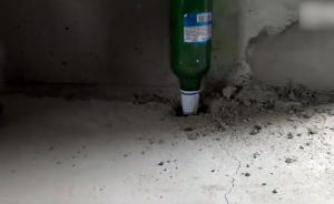 搬遷房被指質(zhì)量差：酒瓶能把地板敲出洞