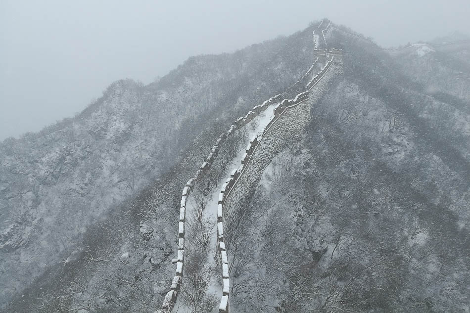 02-VCG1111915829352019年2月14日，春雪給箭扣長城籠罩上了一層薄薄的圣裝，剛從南方回來的筆者與朋友一起爬上長城，用鏡頭記錄下這美麗而驚喜的瞬間。