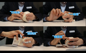 银行职员蒙眼点钞破纪录，数钱磨掉指纹