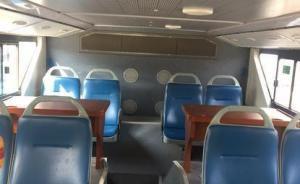 光明日報刊文：公交車上有寫作業(yè)專用“課桌”？實在是想多了