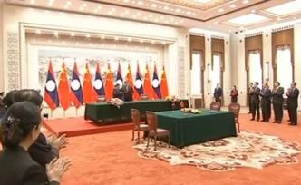 中國老撾簽署命運(yùn)共同體行動(dòng)計(jì)劃，開啟雙邊關(guān)系新時(shí)代