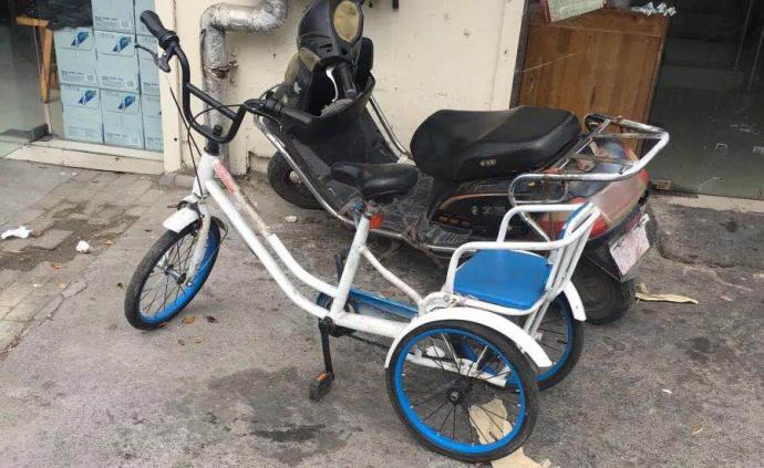 哈啰单车“失联”：被女子改成三轮童车