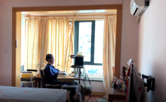 漸凍人馮錦源的“游戲人生”