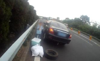 罰！一位媽媽帶孩子G50高速超車道換胎，未放警示標志