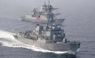 美舰擅闯我南沙岛礁邻近海域，南部战区海空兵力予以警告驱离