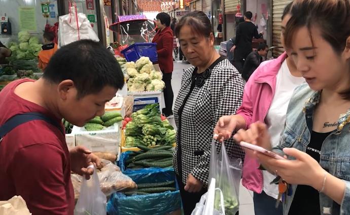 菜販心算快過計算器，全款在西安買房