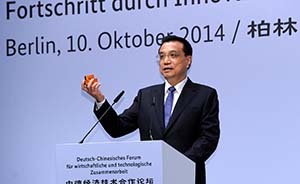 李克強送默克爾“魯班鎖”傳遞出什么?