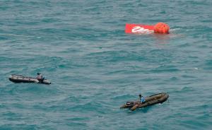 亞航失事客機機尾已出水，大部分遇難者可能在客機主體內(nèi)