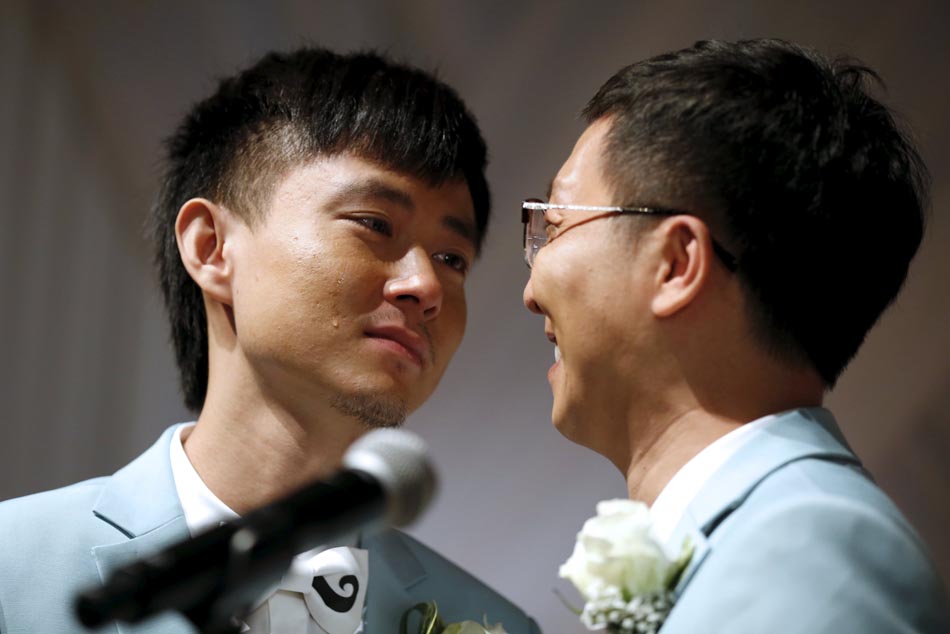 06.2015-06-09T225140Z_696974786_GF10000122342_RTRMADP_3_USA-CHINESE-WEDDINGS