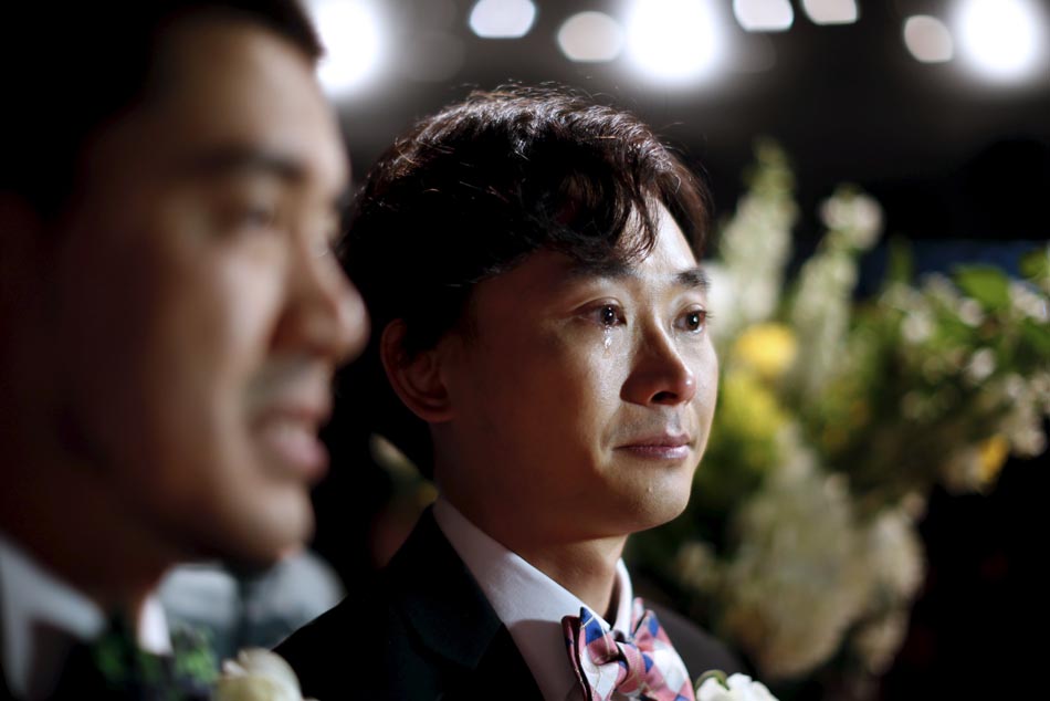 09.2015-06-09T231021Z_1601778279_GF10000122357_RTRMADP_3_USA-CHINESE-WEDDINGS