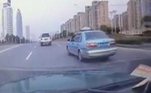 網(wǎng)傳江蘇興化專車司機(jī)斧襲出租車司機(jī)，滴滴：非專車認(rèn)證司機(jī)