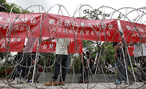 “感受民主震撼”？有人夜里竟到张志军下榻饭店敲锣打鼓