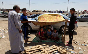 外交笔记|中国应尝试建救援性全球反应力量应对伊拉克危机