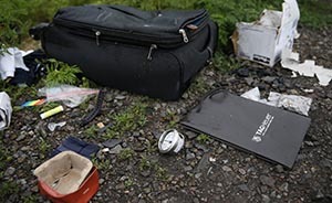 亲属称MH17遇难者电话被接听，对方有东欧口音