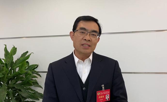 建設(shè)國際航運(yùn)中心應(yīng)吸引相關(guān)機(jī)構(gòu)落滬