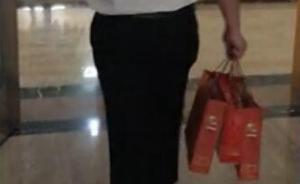 廣東惠州紀委暗訪曝光節(jié)日腐?。喊l(fā)名煙，辦公樓內互相送禮