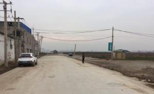 西安回应“农民自掏24万修路成违建”：保留道路，拆除球场