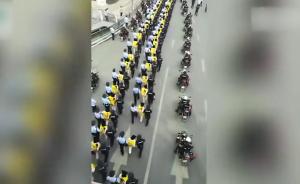 百名犯罪嫌疑人被押赴街头指认现场