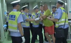 酒驾司机冲卡被截怼交警:我杀了你