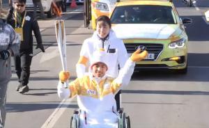 “倒立男孩”完成火炬传递：做有用的人