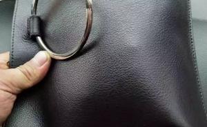 手包找到了失主稱裝九千元的錢包沒了，撿包兩人均稱沒見錢包