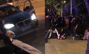 寶馬女車主當街被入車搶劫并刺傷