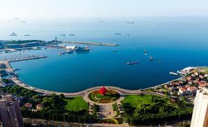 人民日?qǐng)?bào)鐘聲：青島峰會(huì)為世界注入強(qiáng)大正能量